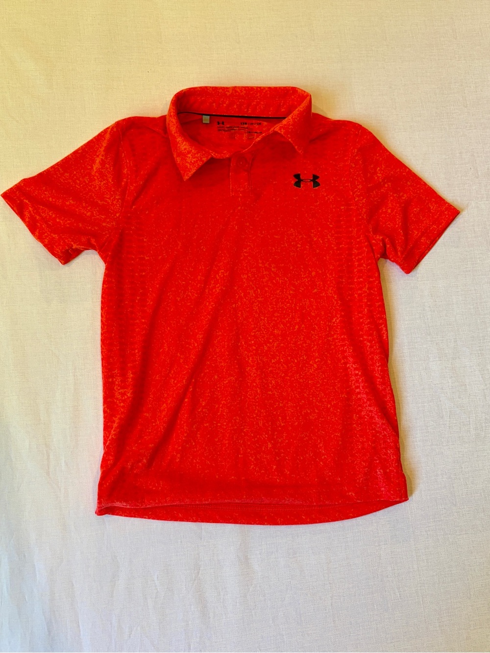 Set of two - Kids small golf shirts. Under armor and slazenger